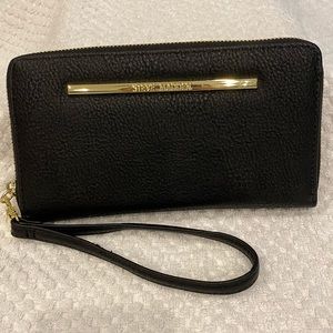 Steve Madden black w/ gold clutch purse.